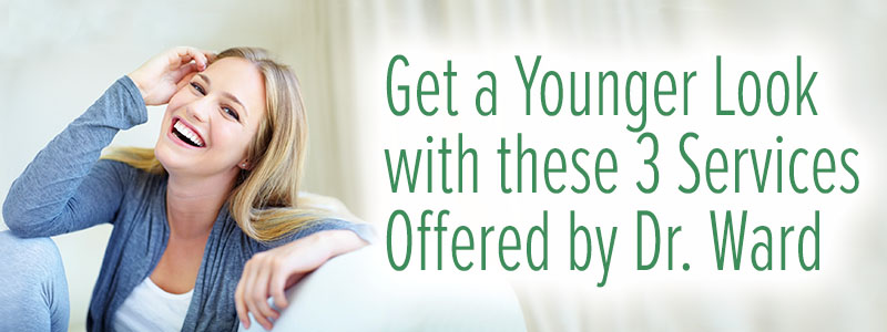 Young blonde woman smiling on couch