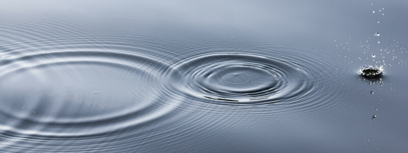 Aerial view of water ripples in water with fluoride that helps prevent tooth decay