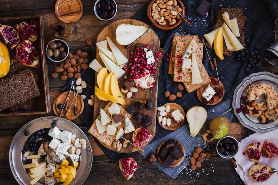 Charcuterie board with healthier snack choices.